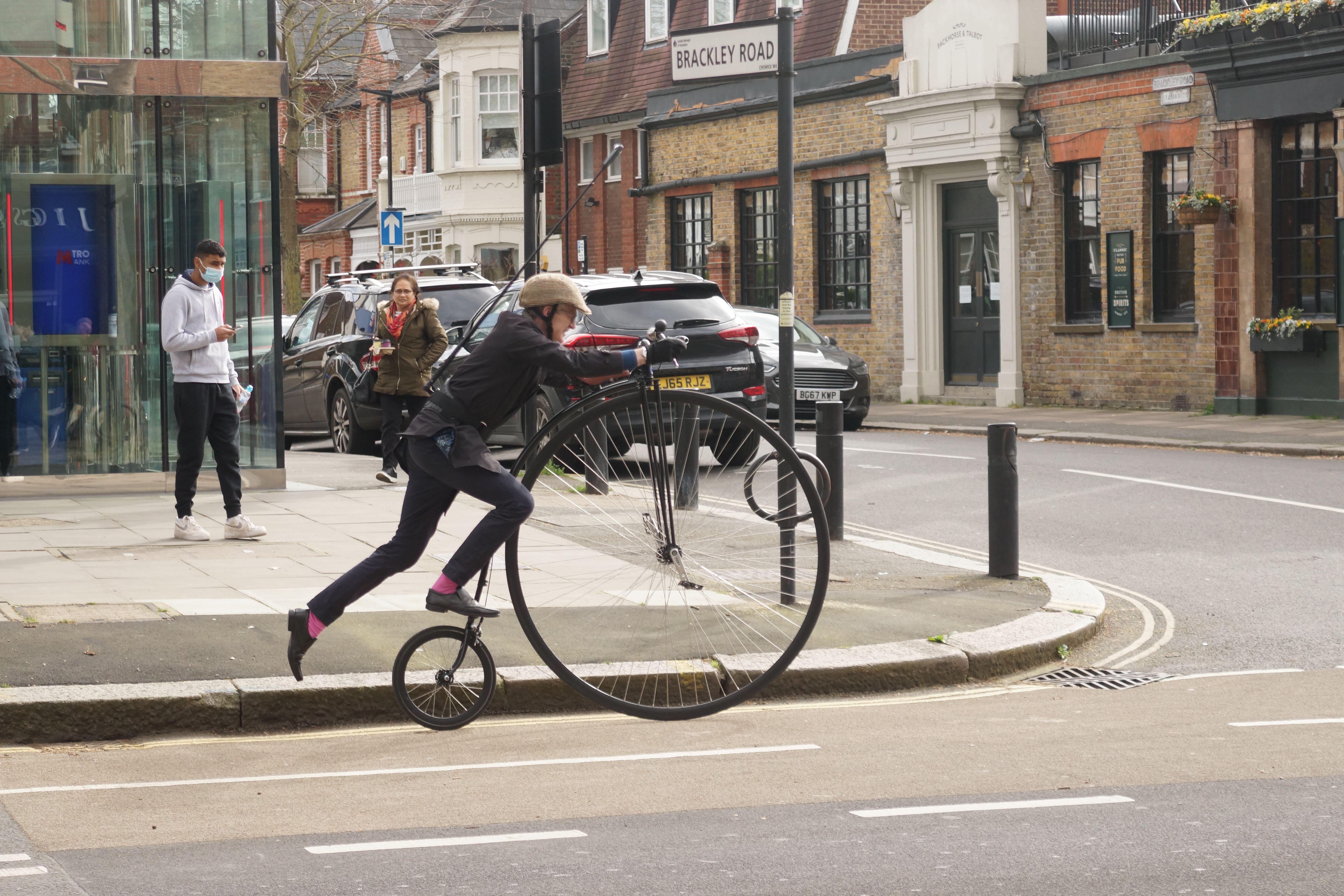 Jeremy Vine Remounts Penny-Farthing in Chiswick High Road.