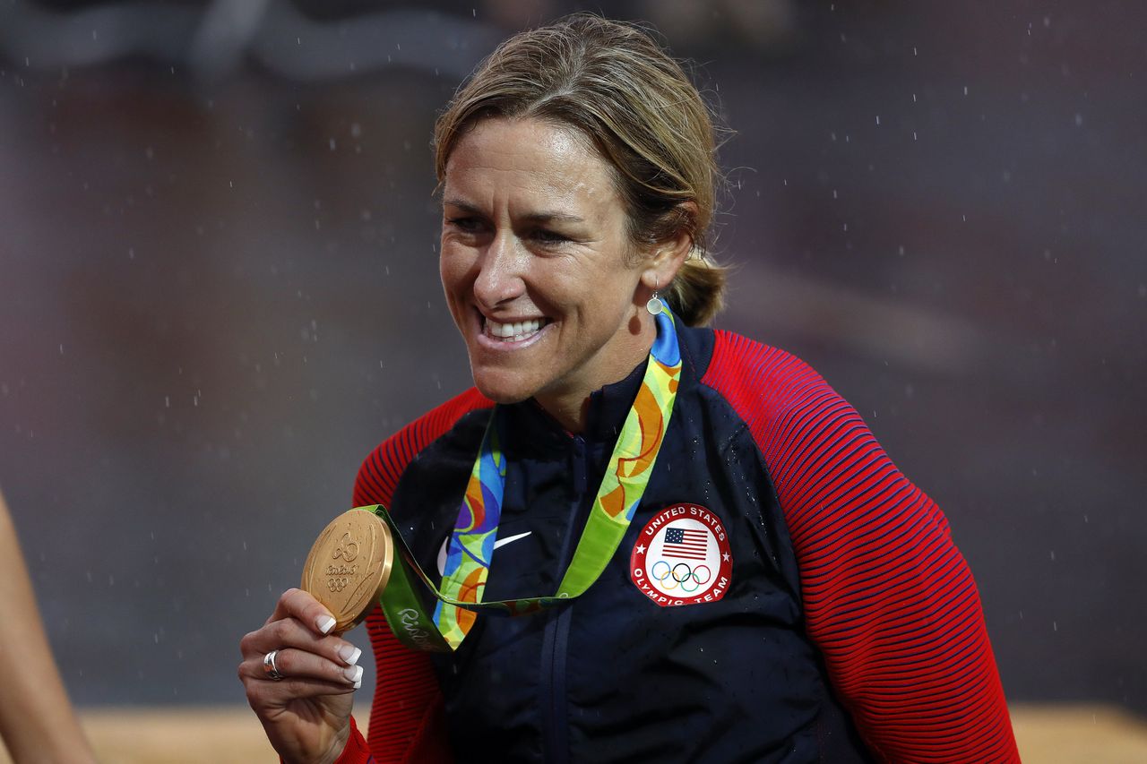 Kristin Armstrong with her third Olympic gold medal
