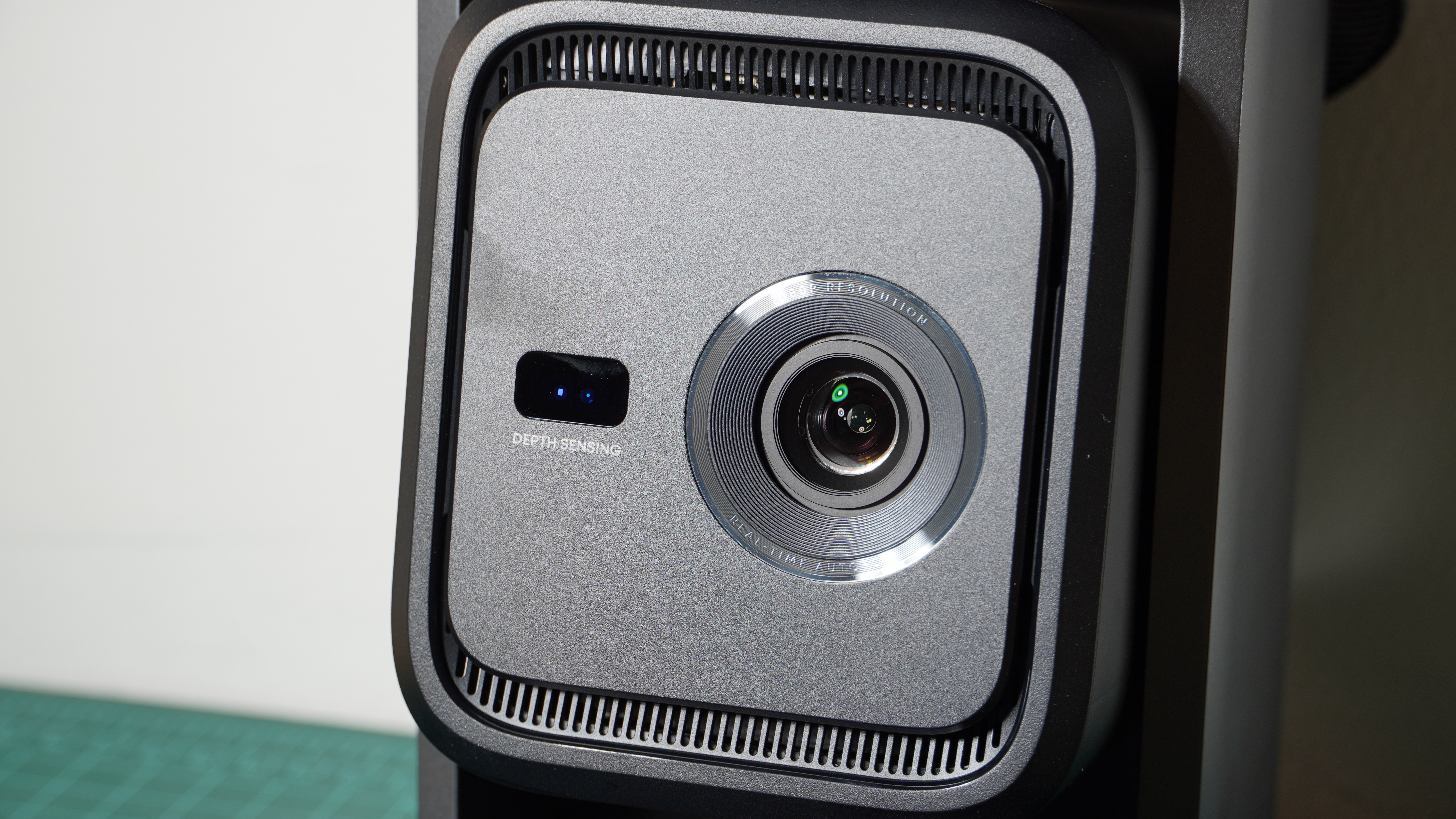 A close up of the lens of the Soundcore Nebula P1 projector