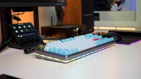 Side profile of Drop Americana Keyboard with RGB lighting on white table