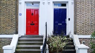Two adjoining front doors, with one red and one blue