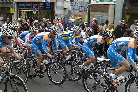 Brad Wiggins (yellow) of Garmin-Slipstream in the peloton during the final stage street curcuit in Carlton.