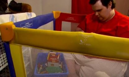 Stanley Thornton Jr. plays with Lego in his customized playpen: The 30-year-old's disability classification is being reviewed and his Social Security could be cut.