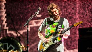 John Frusciante plays a Fender Stratocaster onstage at Lollapalooza 2024