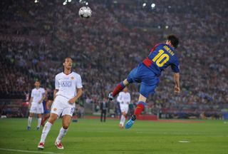 Lionel Messi scores a header for Barcelona against Manchester United in the 2009 Champions League final.