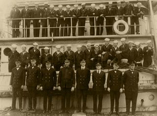 USS Conestoga's Company beside and on the vessel, circa early 1921.