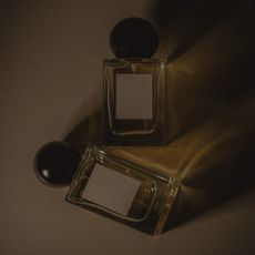 An image of two unlabeled perfume bottles.