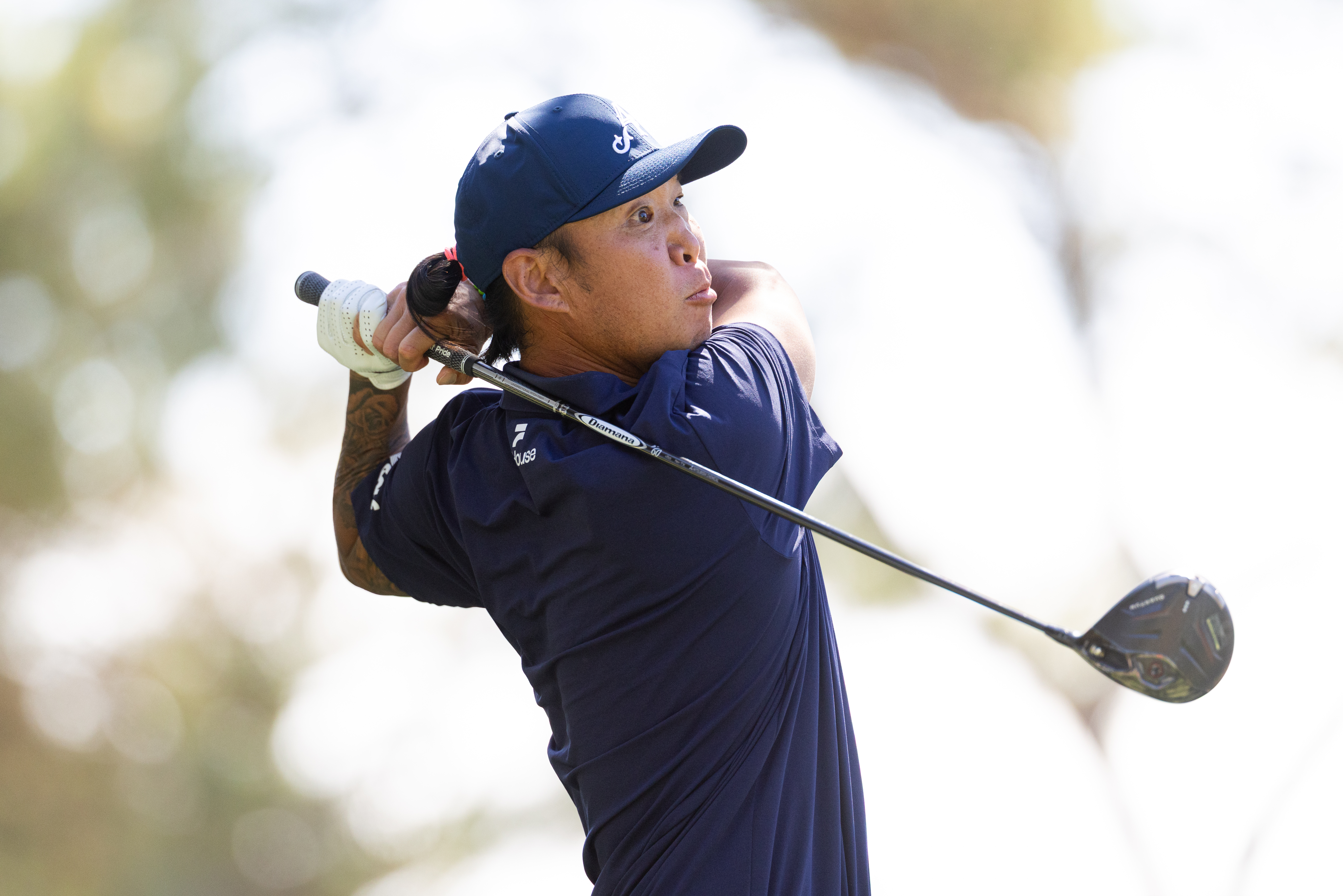 Anthony Kim hits a driver off the tee