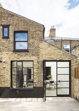 Metal framed windows and doors in a terraced house