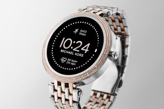 Fossil vs hot sale michael kors smartwatch