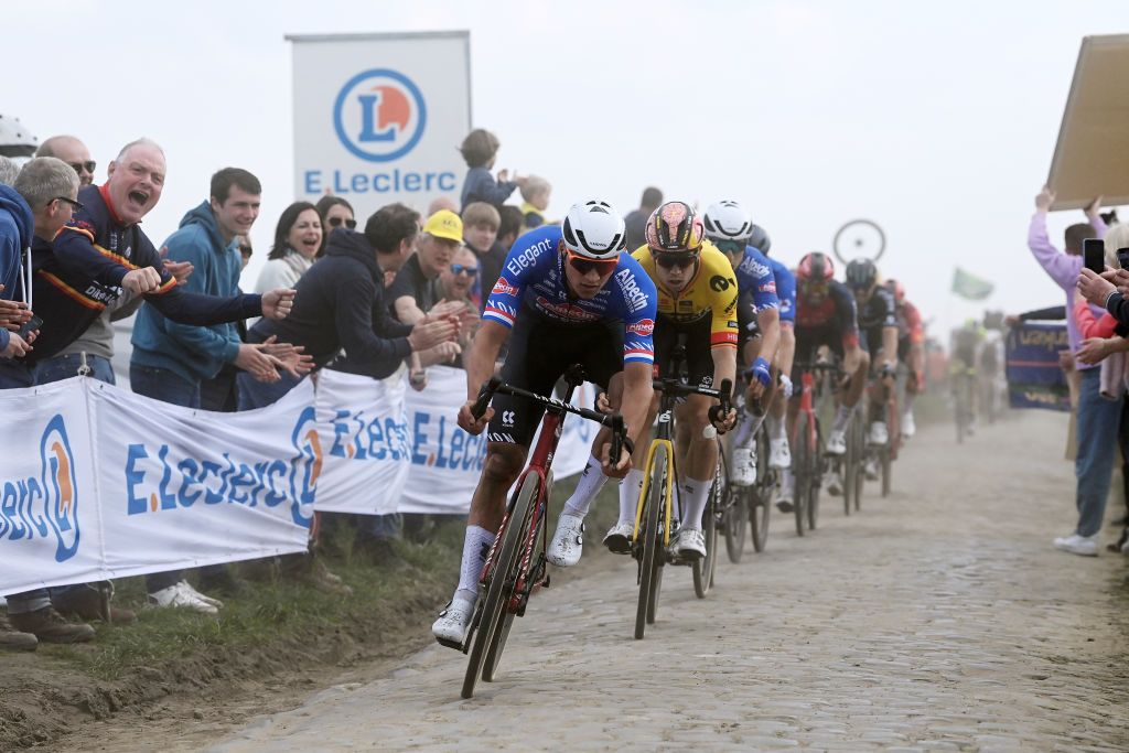 ROUBAIX FRANCE APRIL 09 LR Mathieu van der Poel of The Netherlands and Team AlpecinDeceuninck and Wout Van Aert of Belgium and Team JumboVisma compete in the breakaway during the 120th ParisRoubaix 2023 Mens Elite a 2566km one day race from Compigne to Roubaix on UCIWT April 09 2023 in Roubaix France Photo by Tim de WaeleGetty Images