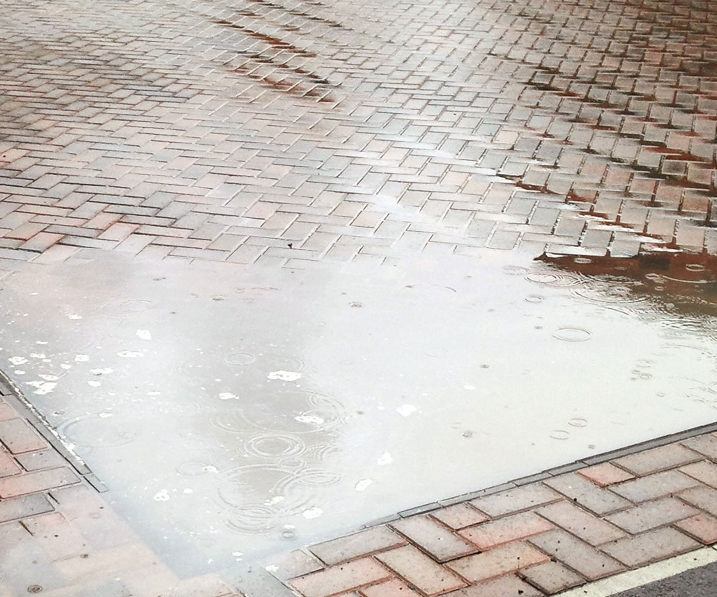 flooding on blocked paved driveway