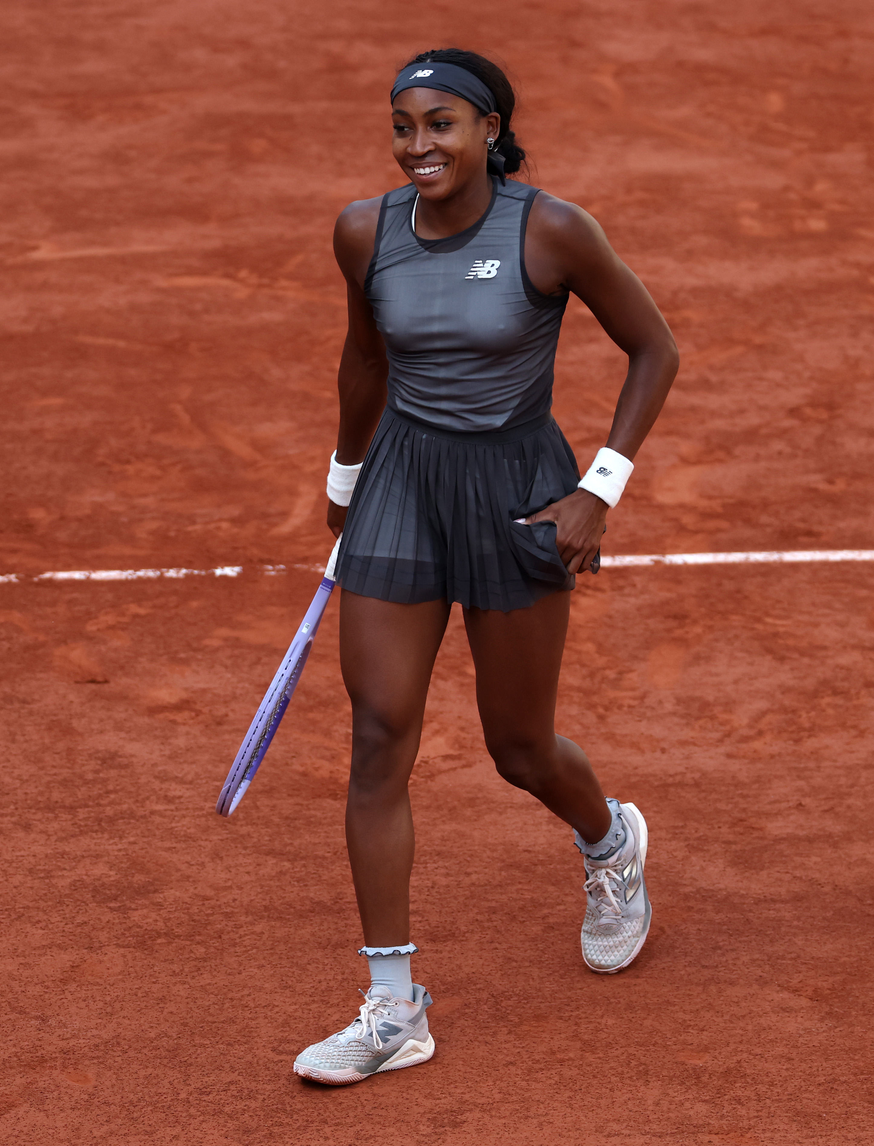 Coco Gauff wore a custom tennis dress from New Balance, alongside chunky sneakers at the 2026 French Open