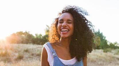  Sounds for mental health, Woman Laughing While Standing in a field