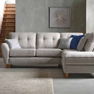 Grey corner sofa in a grey living room
