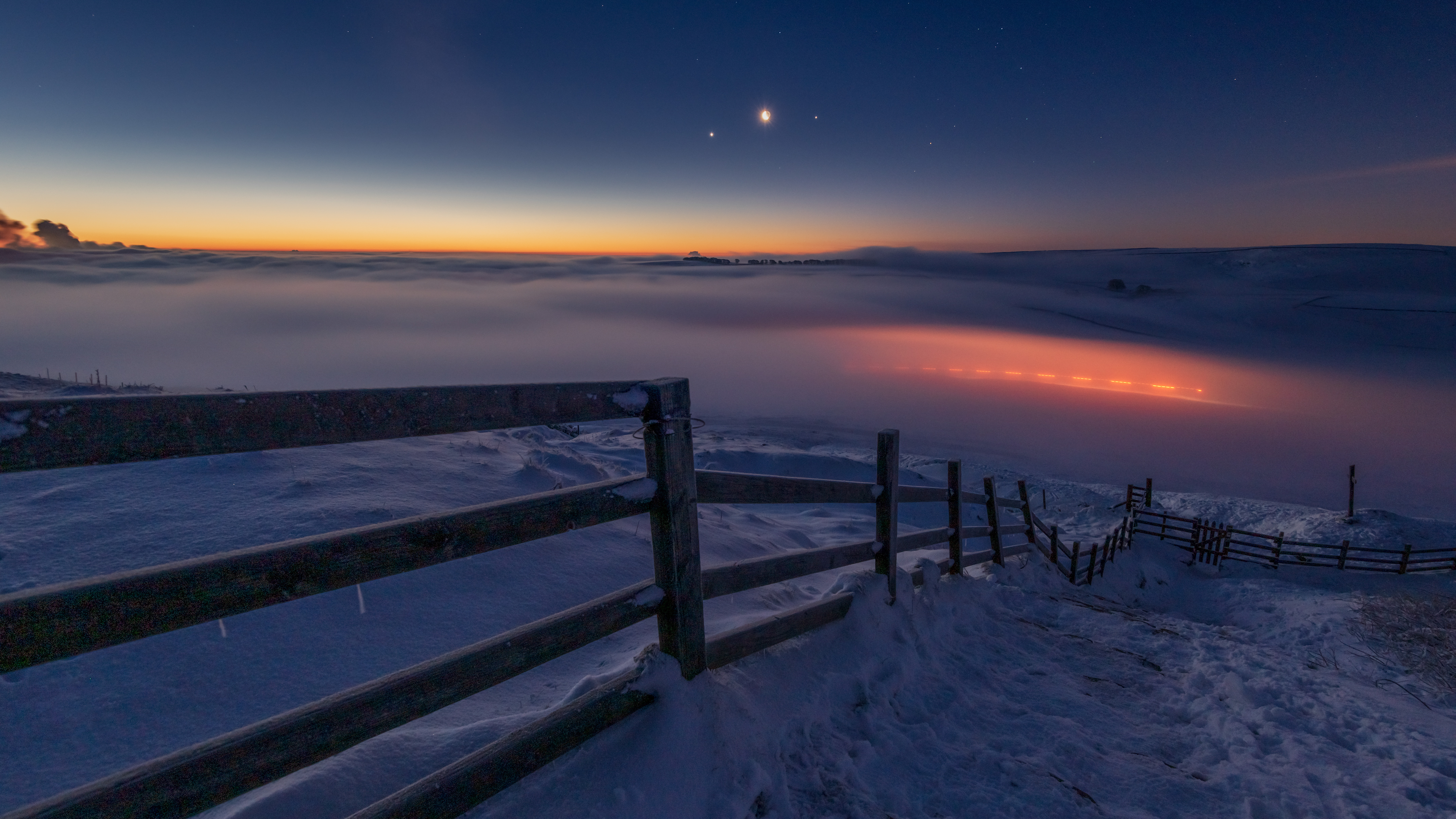 Jupiter, Venus and the moon lined up in the early morning sky in a phenomenon known as a conjunction. Derbyshire, Peak District. UK
