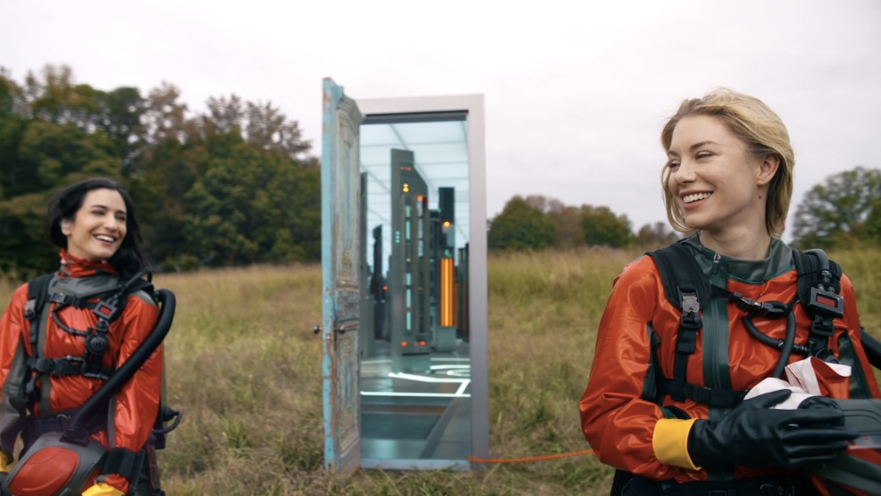 Harcourt standing on Salvation planet in front of open doorway in Peacemaker Season 2 finale