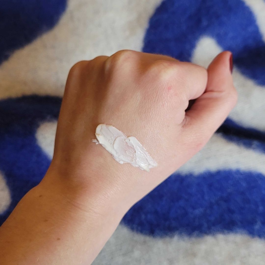 Swatch of Charlotte Tilbury Magic Cream on back of hand