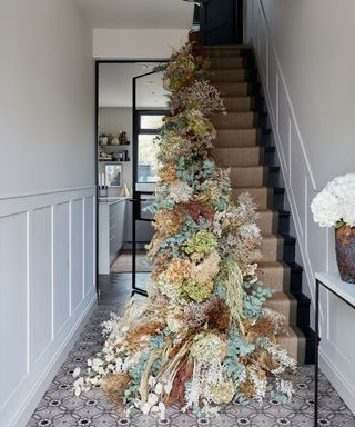 Designer Justin Coakley's neutrally decorated home stylishly dressed for Christmas