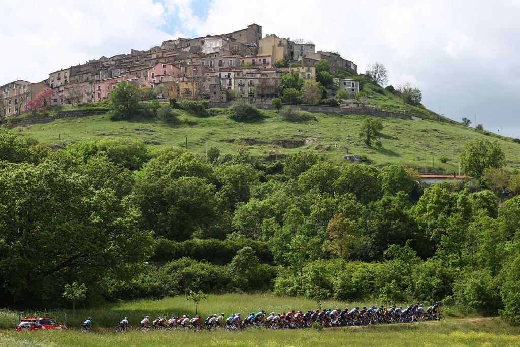 POTENZA ITALY MAY 13 A general view of the peloton passing through Viggiano 1023m during the 105th Giro dItalia 2022 Stage 7 a 196km stage from Diamante to Potenza 717m Giro WorldTour on May 13 2022 in Potenza Italy Photo by Michael SteeleGetty Images