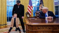 Elon Musk, with son X and Donald Trump in the Oval Office