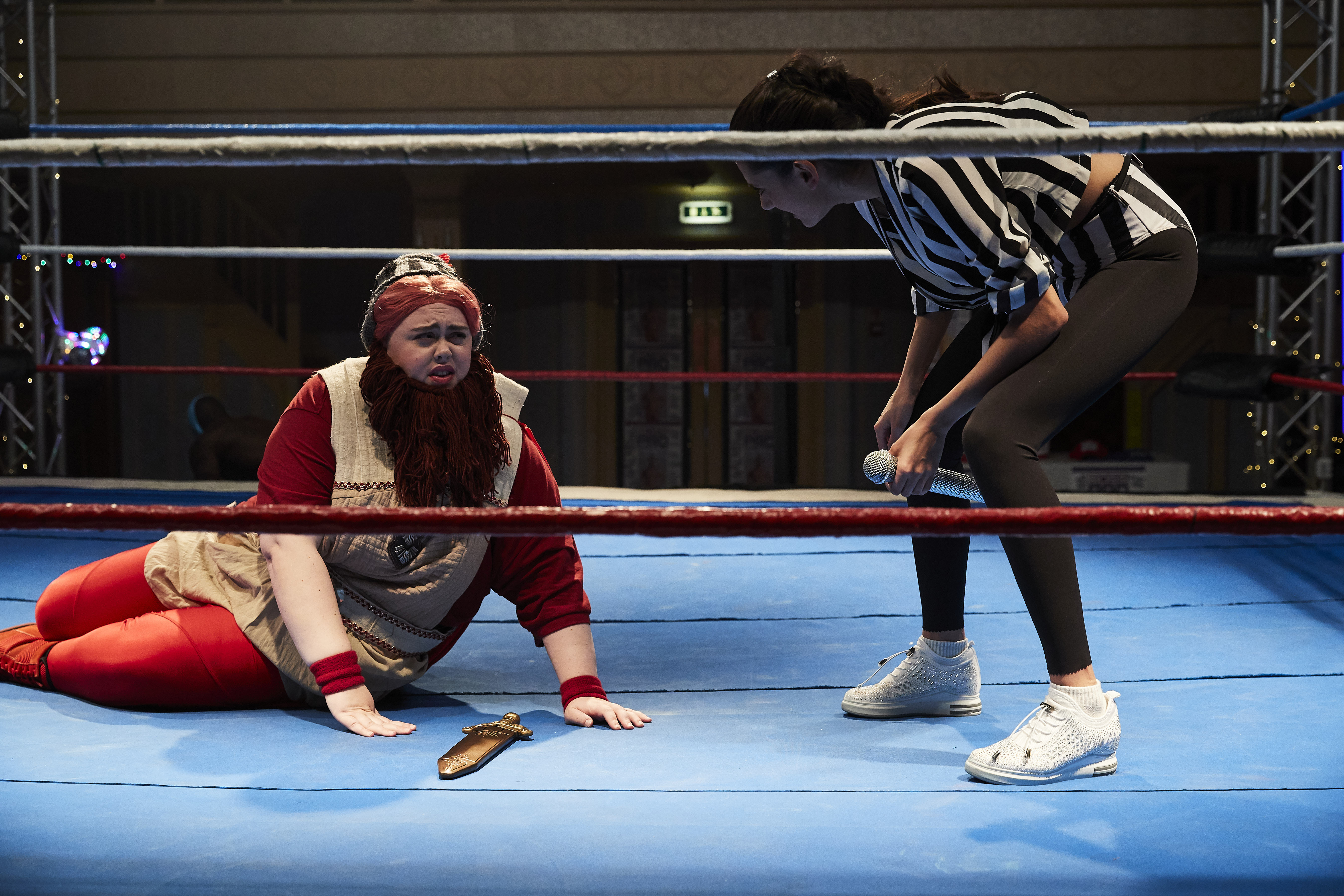 Bertha (Sharon Rooney) is a wrestler with many disguises.