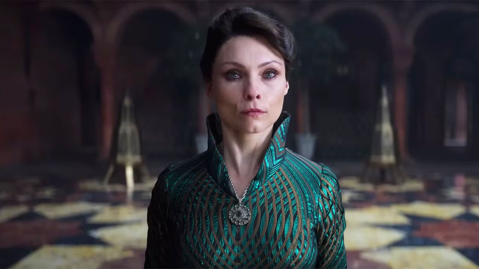 Tissaia cries while looking at something offscreen