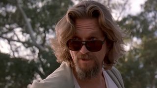 Jeff Bridges as The Dude, looking above a pair of sunglasses in The Big Lebowski