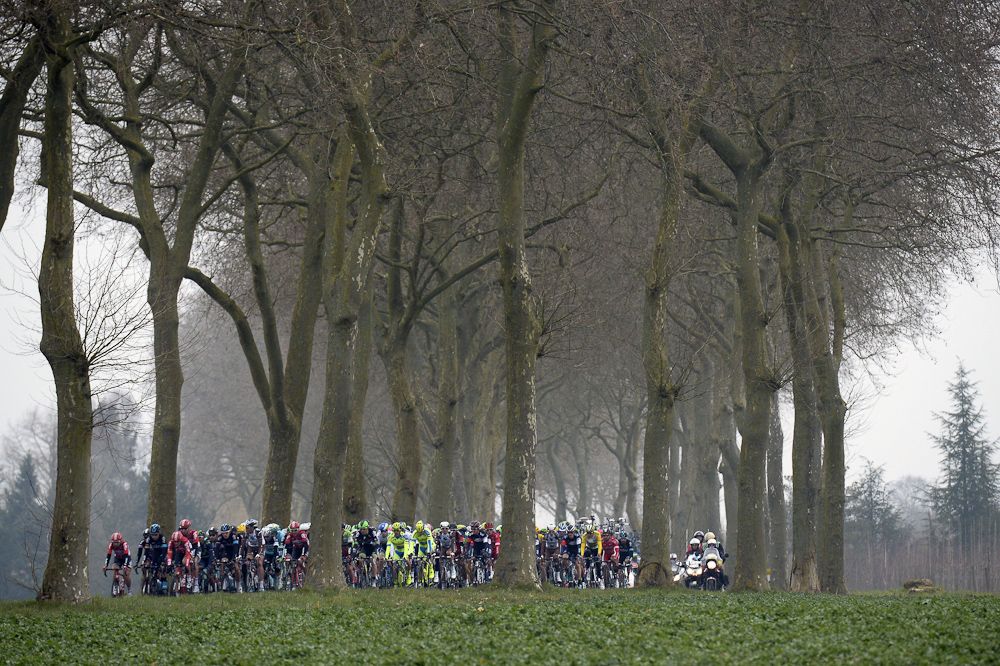 The pack rides during the first stage of the 73rd edition of the Paris-Nice.