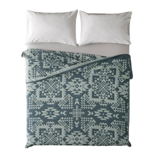 Teal patterned bed covers