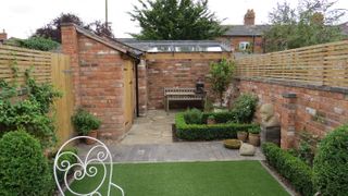 small garden with new brick walls