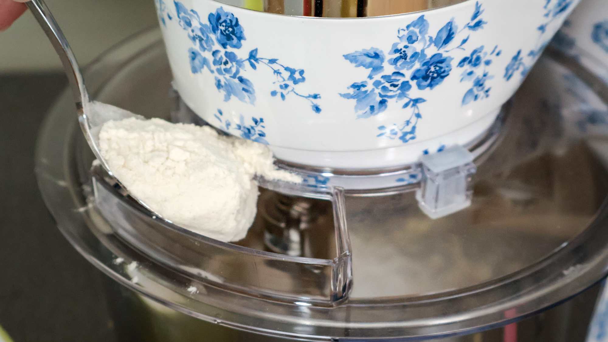 Laura Ashley stand mixer adding flour to cake batter