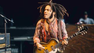 Lenny Kravitz performing onstage in 1990