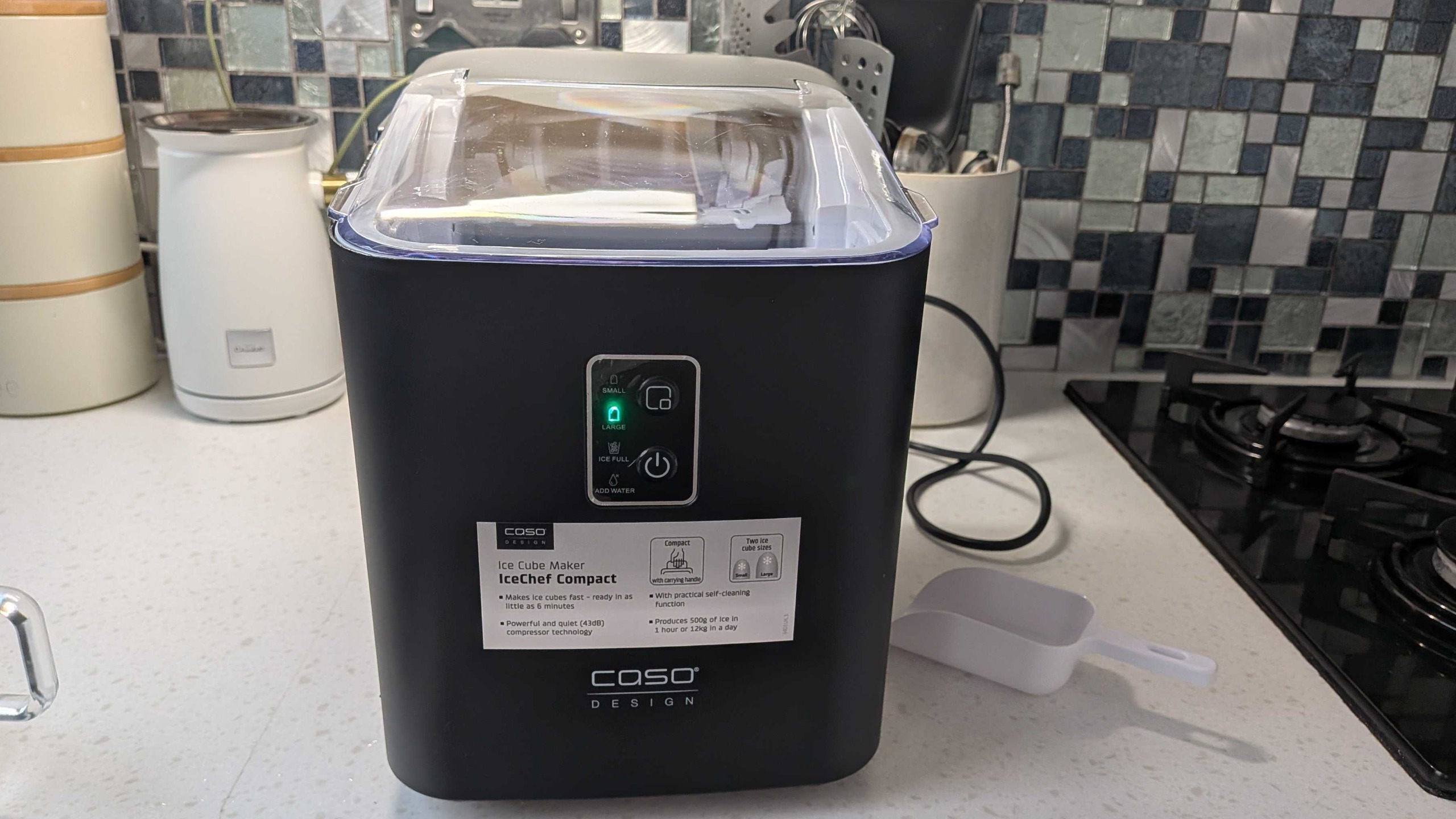 CASO Design IceChef Compact Ice Cube Maker on white countertop