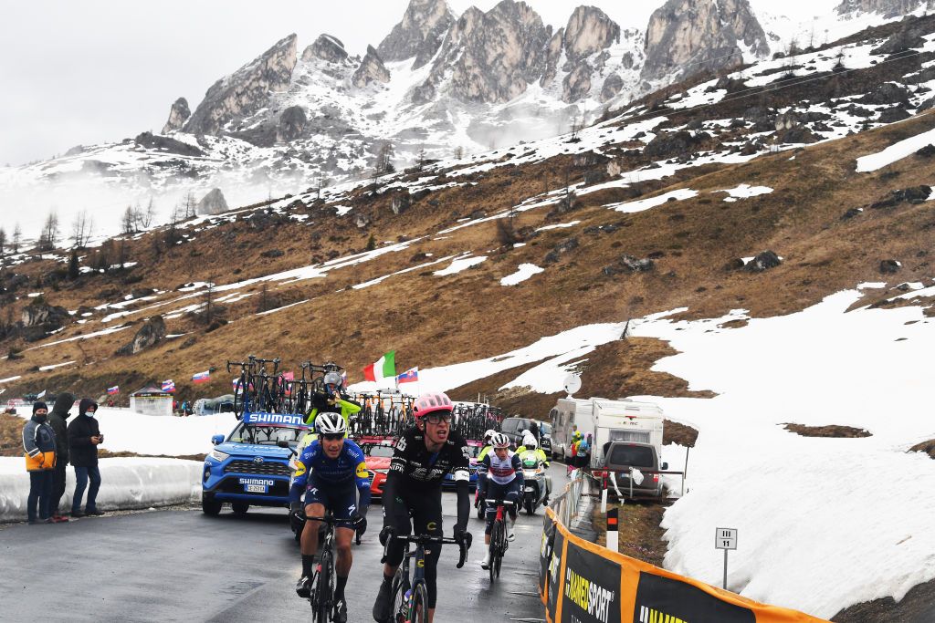 CORTINA DAMPEZZO ITALY MAY 24 Giulio Ciccone of Italy and Team Trek Segafredo Joao Almeida of Portugal and Team Deceuninck QuickStep Hugh Carthy of United Kingdom and Team EF Education Nippo in breakaway passing through Passo Giau 2233m during the 104th Giro dItalia 2021 Stage 16 a 153km stage shortened due to bad weather conditions from Sacile to Cortina dAmpezzo 1210m Snow girodiitalia Giro on May 24 2021 in Cortina dAmpezzo Italy Photo by Tim de WaeleGetty Images