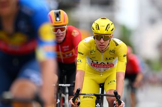 PAU FRANCE JULY 12 Tadej Pogacar of Slovenia and UAE Team Emirates Yellow Leader Jersey crosses the finish line during the 111th Tour de France 2024 Stage 13 a 1653km stage from Agen to Pau UCIWT on July 12 2024 in Pau France Photo by Dario BelingheriGetty Images