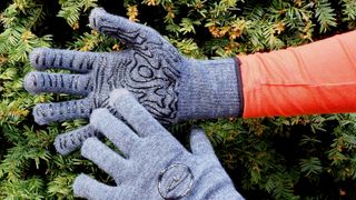 Grey cycling gloves on hands