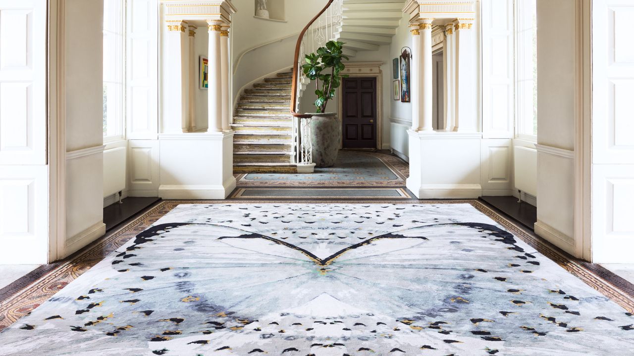 Alexander McQueen rug with a large butterfly design