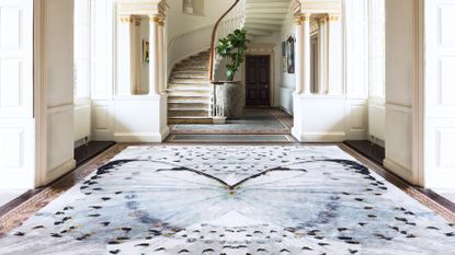 Alexander McQueen rug with a large butterfly design