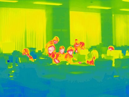 Heat map styled photo of people in office environment