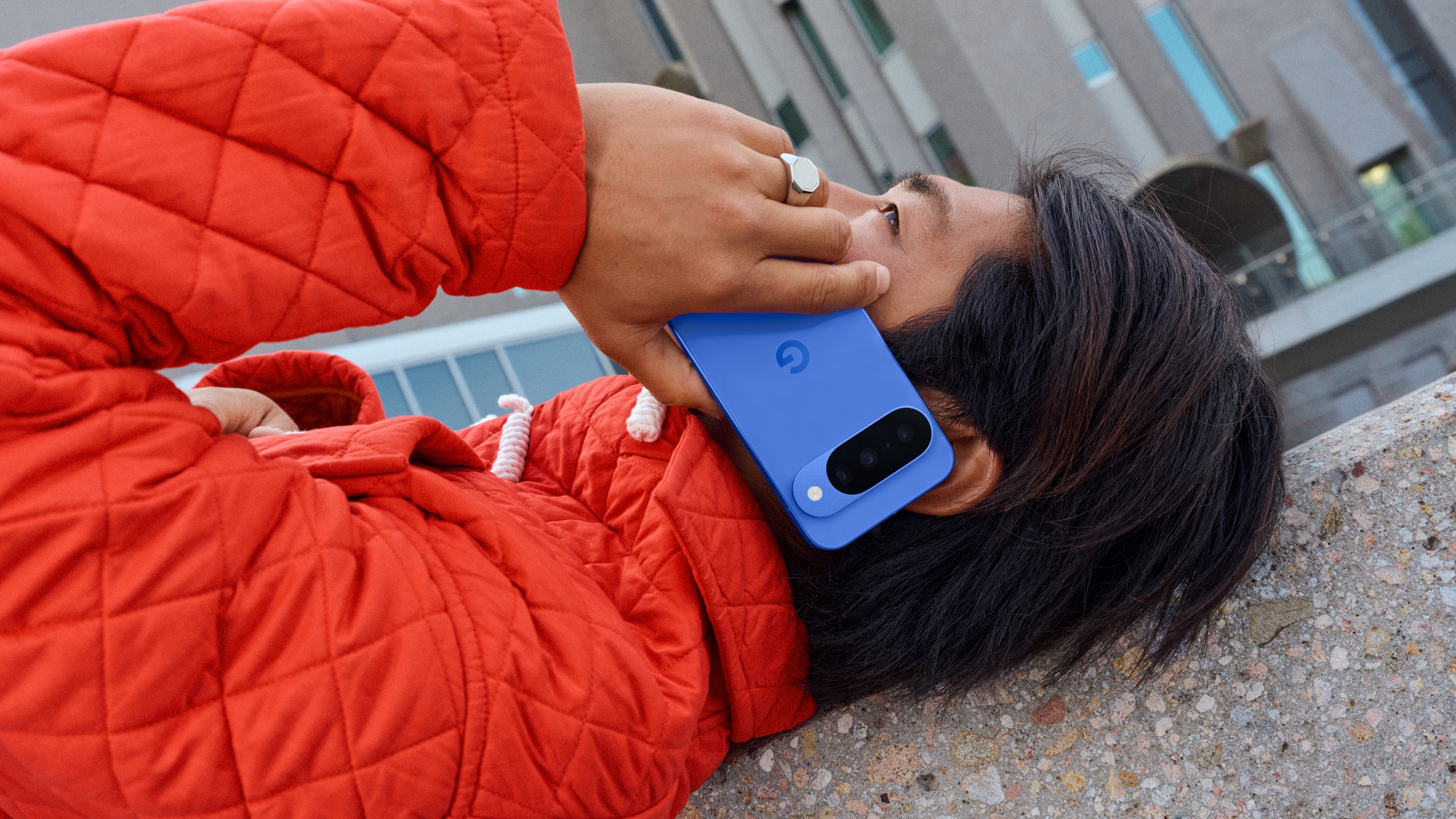 Person making a phone call on a Google Pixel 10 cell phone