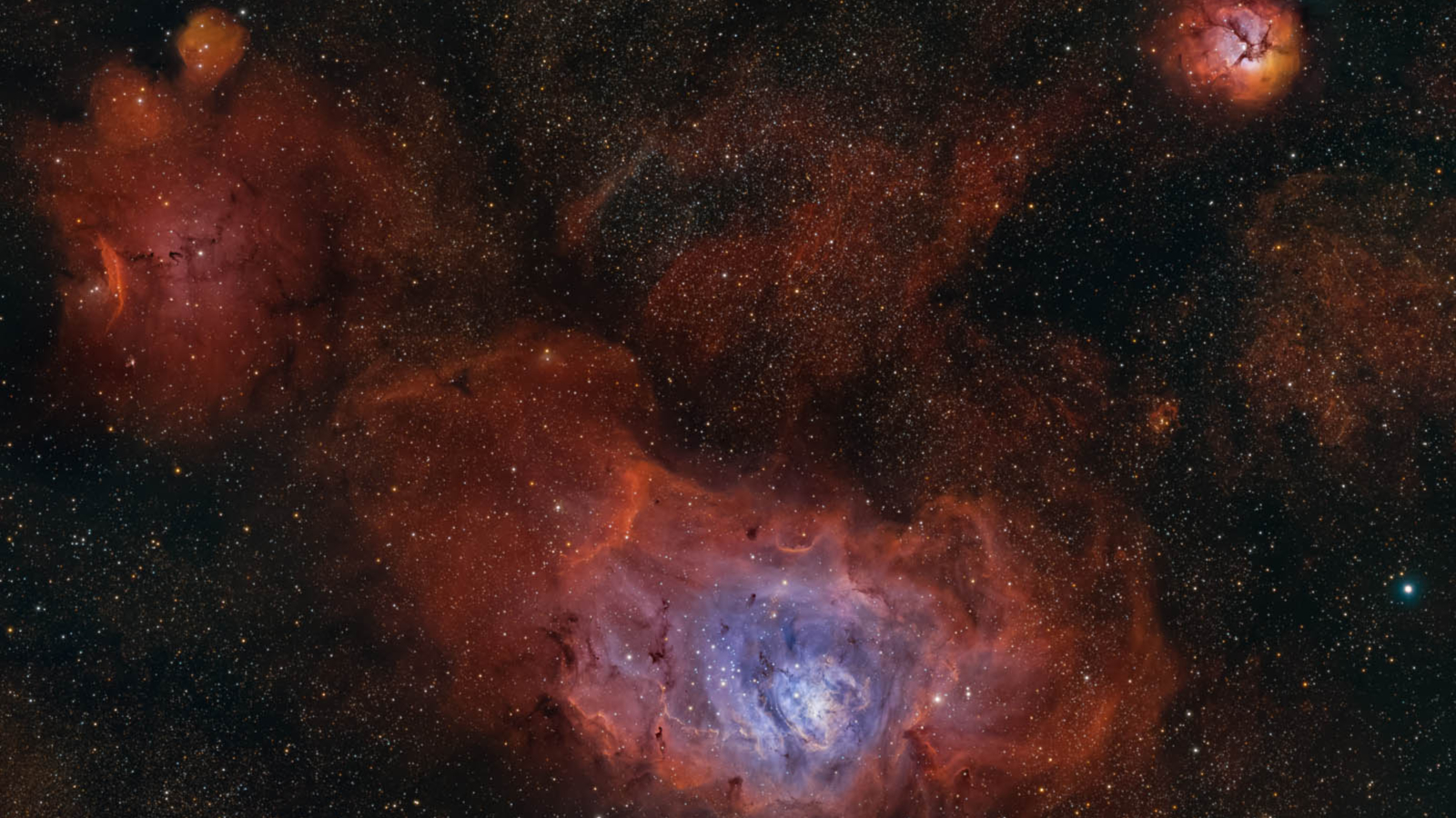 Swirls of red and purple over a dark background