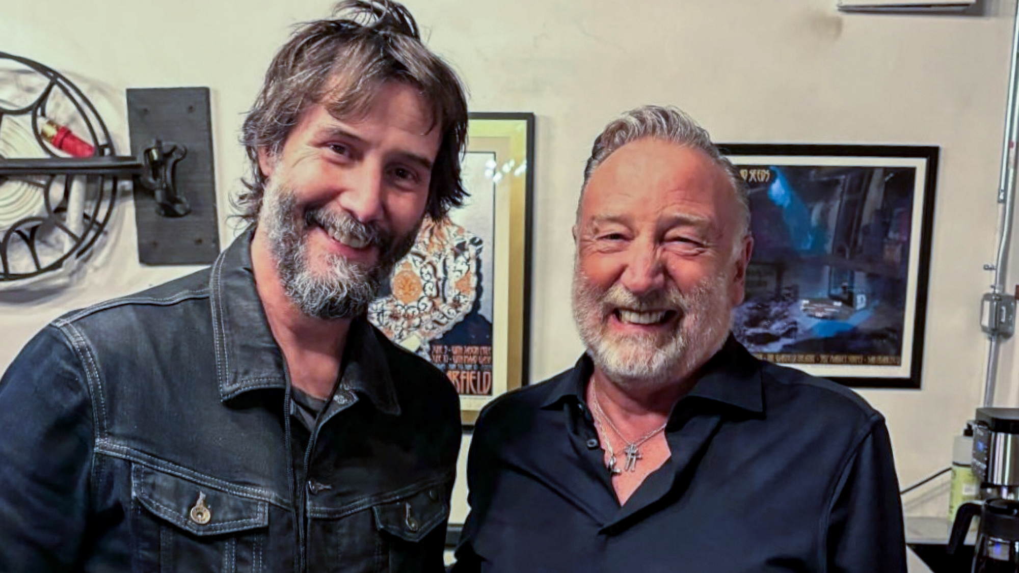 Keanu Reeves (left) and Peter Hook backstage at the Warfield in San Francisco, September 21, 2026