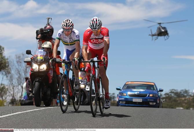 Early escapees Will Clarke (Drapac) and Neil van der Ploeg (UniSA) crest the brow of a hill on stage 1 of the Tour Down Under.
