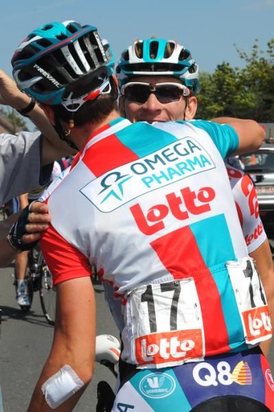 Andr&eacute; Greipel celebrates his stage win with teammate Kenny De Haes.
