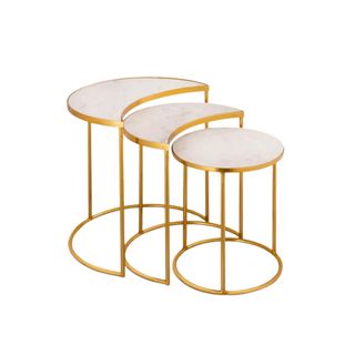 A set of three gold and marble patterned nesting tables