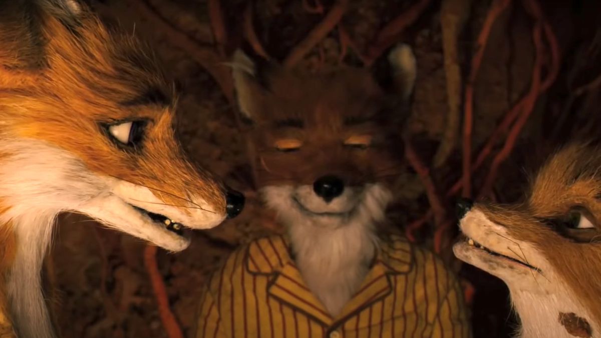 Mr Fox, Ash Fox and Mrs. Felicity Fox standing together during the movie Fantastic Mr. Fox.