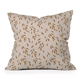 Leaf patterned throw pillow