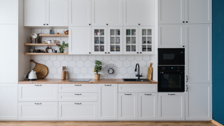 Kitchen with cupboards with windows