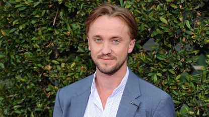Tom Felton attends opening of The Wizarding World of Harry Potter